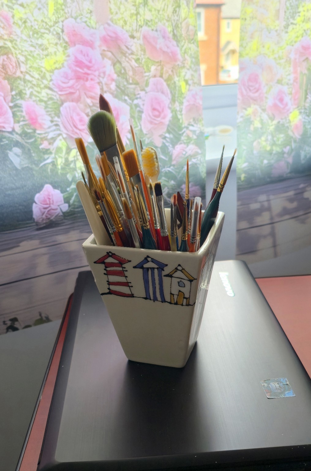 Brushes in the artist’s workspace
